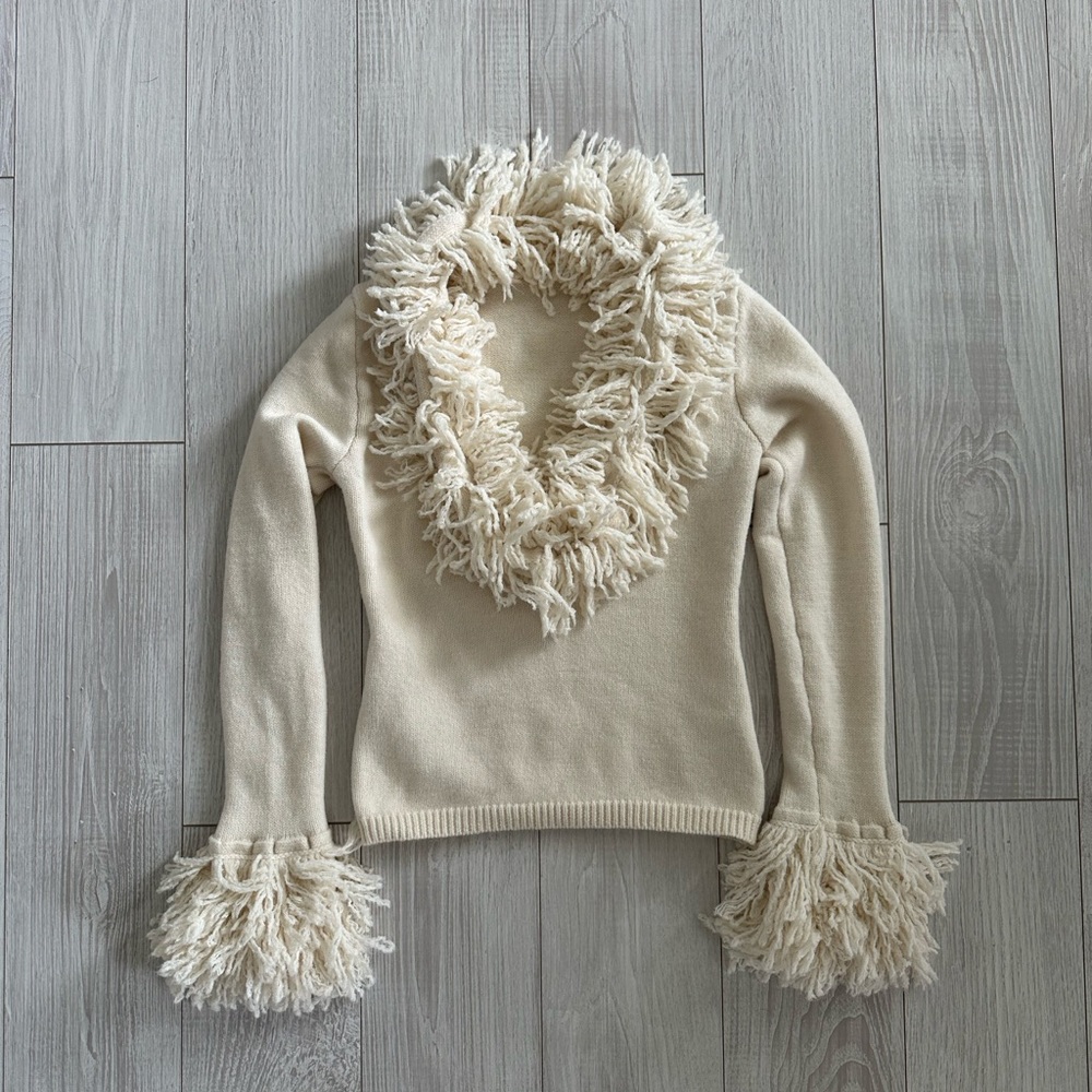 Elegant Cream Sweater with Fringe Details